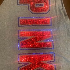 Gray pink tank with blue and red stone